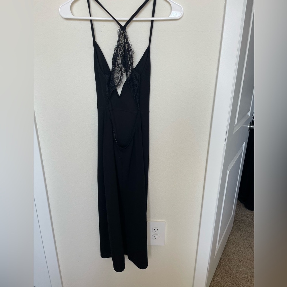 Long black strappy dress with crossed lace  low plunging back